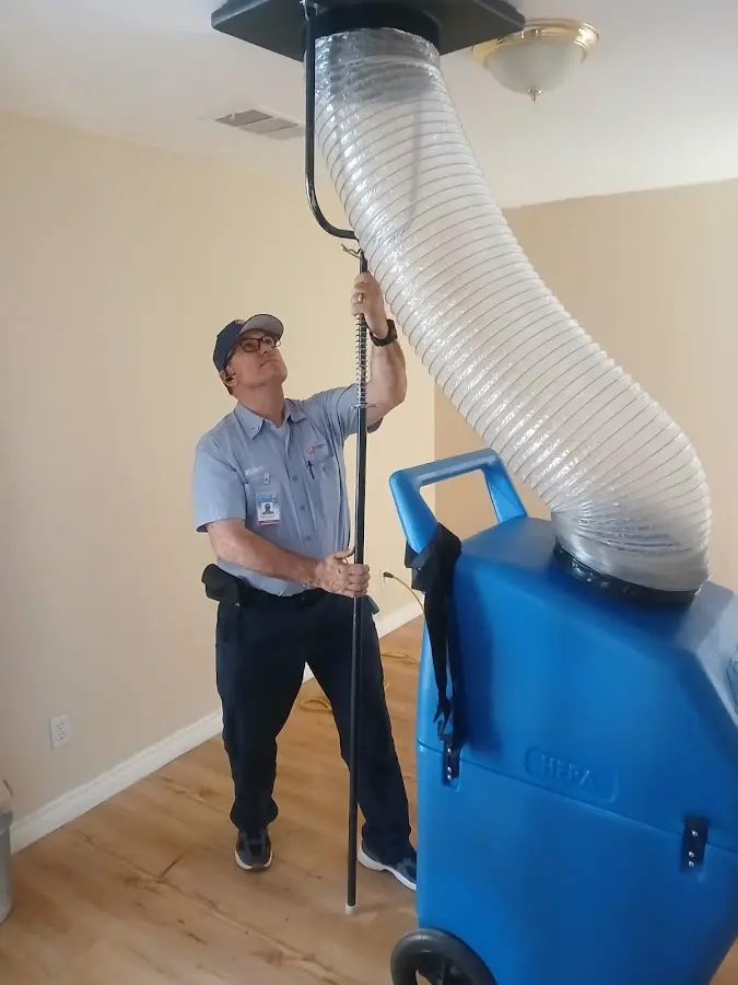 Furnace Tune-Up technician using HEPA equipment in Jefferson Hills